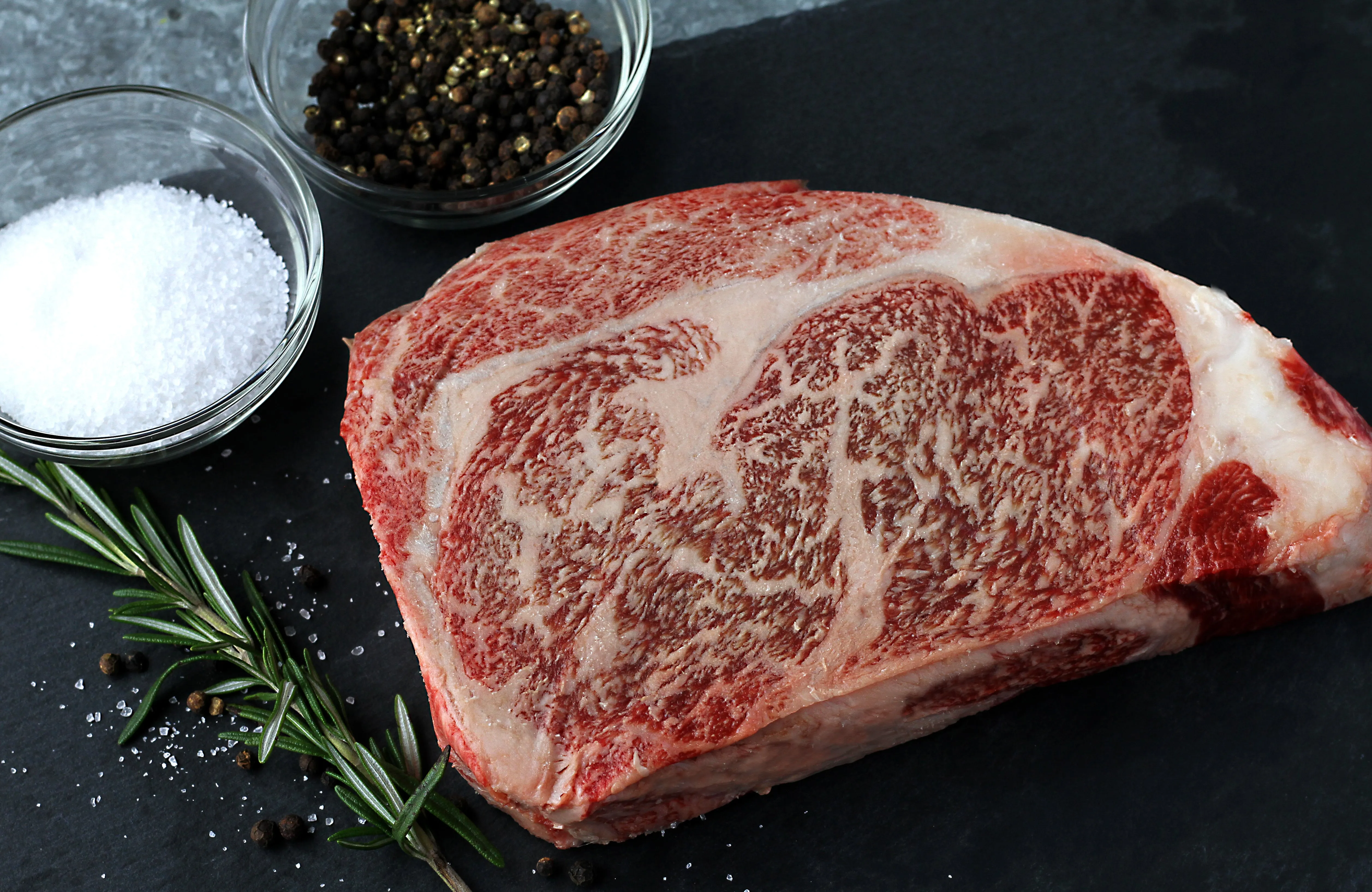 Signature Steaks - Wagyu Ribeye, NY Strip, Filet Mignon