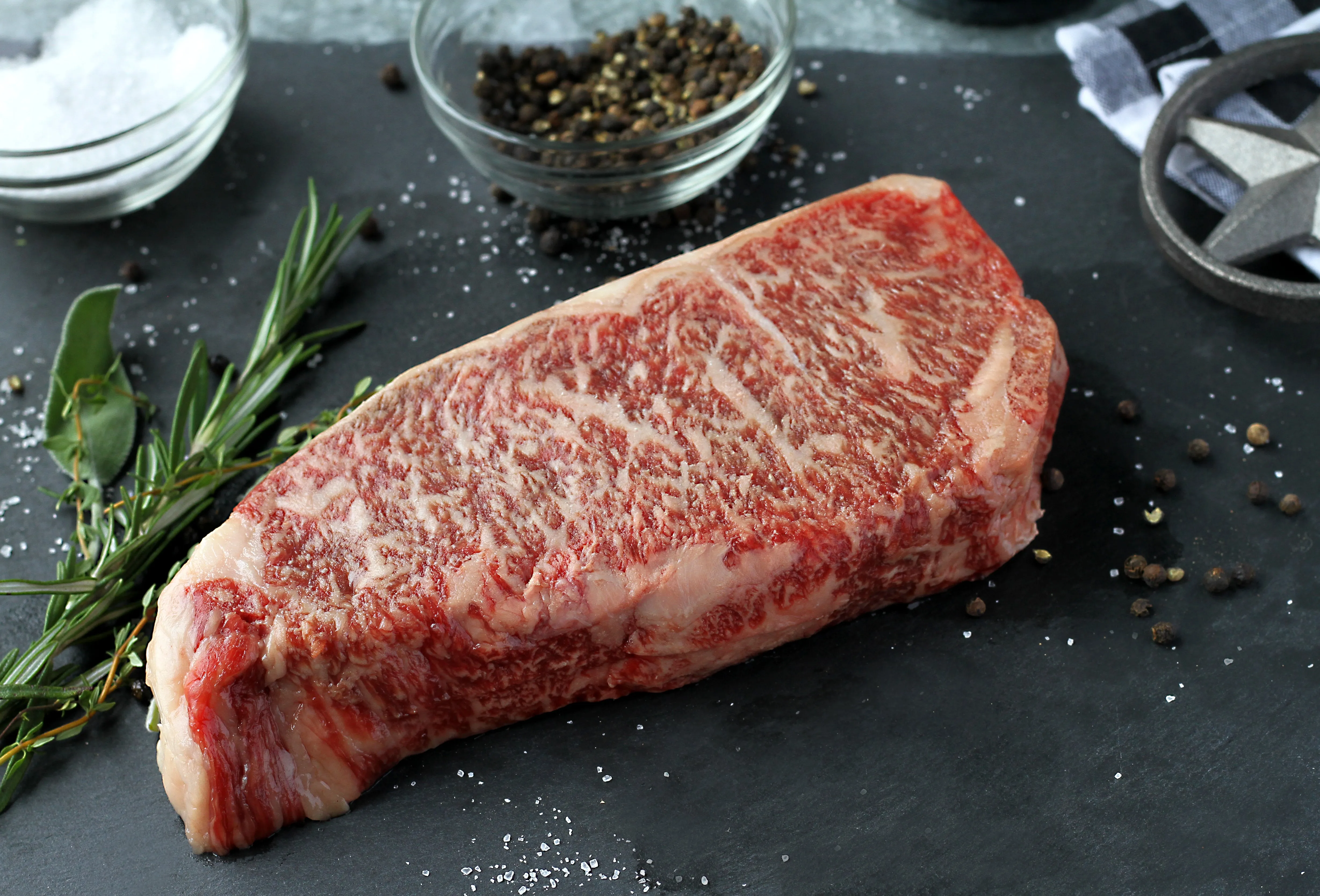 Signature Steaks - Wagyu Ribeye, NY Strip, Filet Mignon
